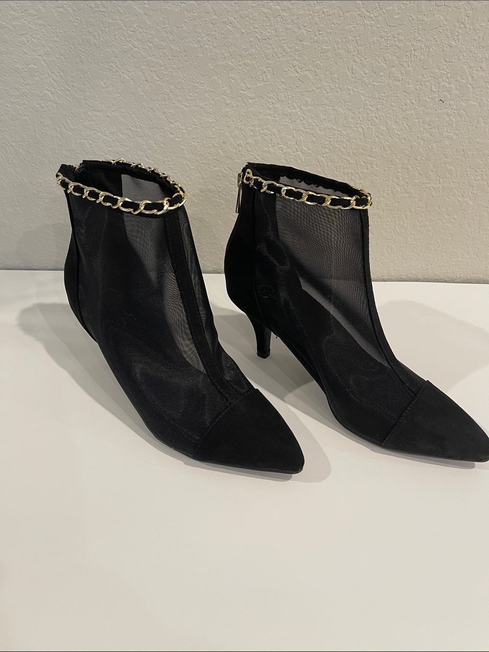 Black mesh ankle boots with pointed toe. New, size 7 in box.